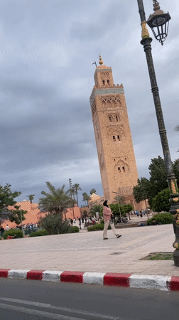 Ornate minaret tower documented in Marrakesh park setting