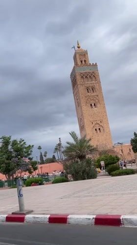 Ornate minaret tower documented in Marrakesh park setting