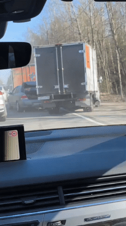 Car rear-ended by truck in Repino, Russia
