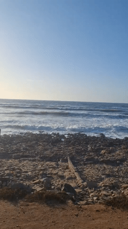 Coastal scenes and coded graphics captured in Dar Bouazza