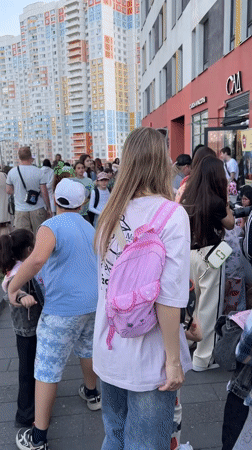 Children gather for outdoor drumming lesson in Mytishchi park