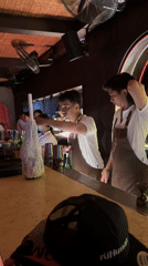 Bartender prepares cocktails at Giselle bar in North Kuta