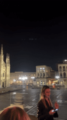 Milan nightlife captured: cathedral views and bar crowds
