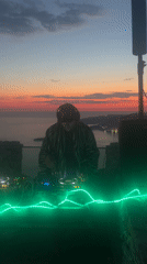 DJ performs mountaintop set, beachgoer relaxes in Montenegro coastal area