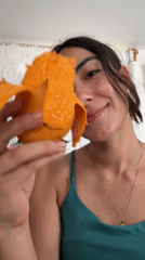 Woman enjoys mango snack in Puebla, Mexico