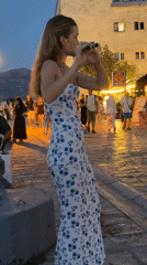 Flute performance at dusk on Budva's waterfront promenade