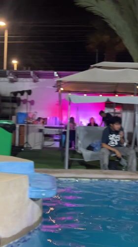 Late night pool party with food in Arica, Chile