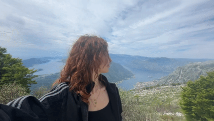 Tourist Takes Selfies Overlooking Bay of Kotor in Montenegro