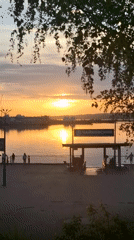 Sunset gathering captured along Kama River in Chaikovsky, Russia