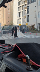 Tel Aviv street scenes include bride crossing, scooter transport