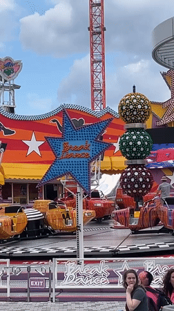 Carnival rides and Vienna Giant Ferris Wheel captured