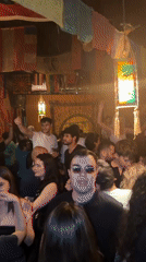 Young adults party at Yerevan bar with dancing and drinks
