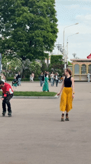 Moscow residents enjoy afternoon leisure activities at park, historic venue