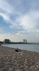 Late afternoon beach scenes documented in Barcelona