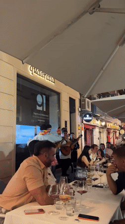 Lei-wearing band serenades diners at Alicante restaurant