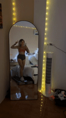 Peace sign selfie on a treadmill in a Thai gym