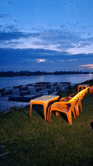 Evening life captured along Lhokseumawe waterfront during dusk hour