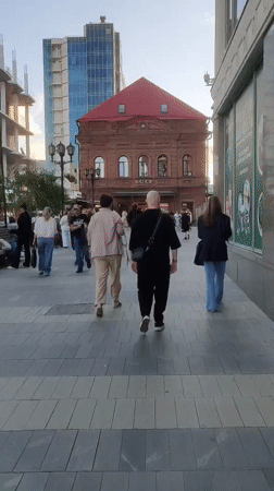 Busking and street life on a Yekaterinburg sidewalk