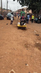 Daily street life documented across Jos, Nigeria commercial district