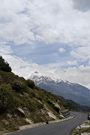 Morning in Jagle: Himalayan peaks, terraced hills, and a mountain guesthouse