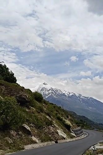 Morning in Jagle: Himalayan peaks, terraced hills, and a mountain guesthouse