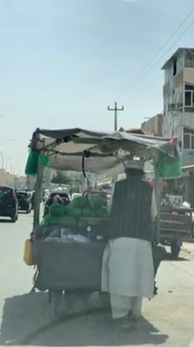 Morning street life documented across Kandahar commercial districts