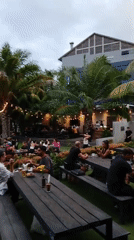 Busy open-air dining spot in North Kuta at dusk