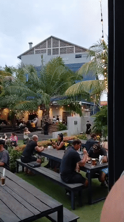 Busy open-air dining spot in North Kuta at dusk