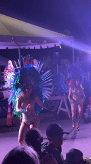 Feathered performers and live music light up Provincetown streets at night