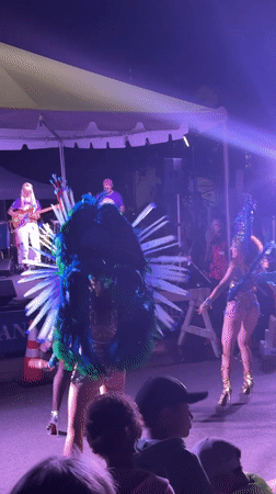Feathered performers and live music light up Provincetown streets at night