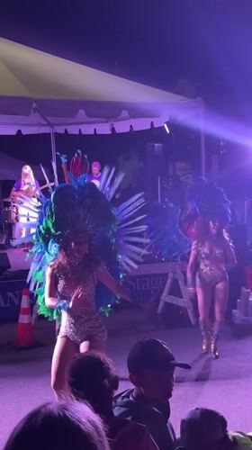 Feathered performers and live music light up Provincetown streets at night