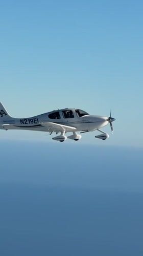Cirrus SR22 in clean cruise near the California coast