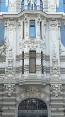 Tourists photograph Art Nouveau architecture in Riga