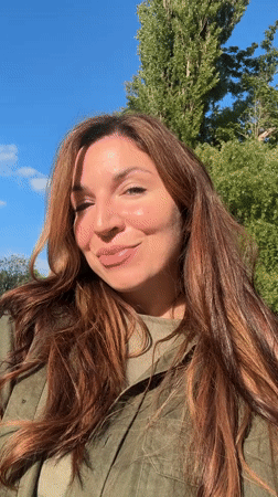 Woman enjoys spring flower photography session in Kryvyi Rih
