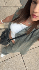 Woman takes selfies at Angel of Independence monument