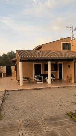 Summer evening at a Mallorcan holiday home, pool and all.