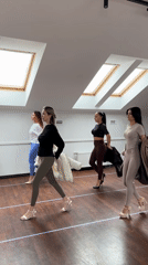 Four women practice runway walking in Riga studio
