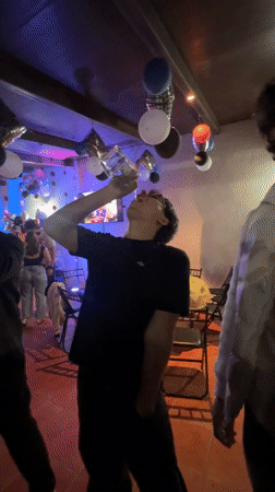 Birthday party with cake and tacos in Mexican town