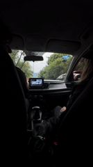 Car interior view captured from backseat in Mexico City