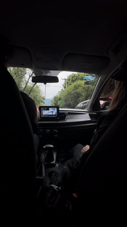 Car interior view captured from backseat in Mexico City