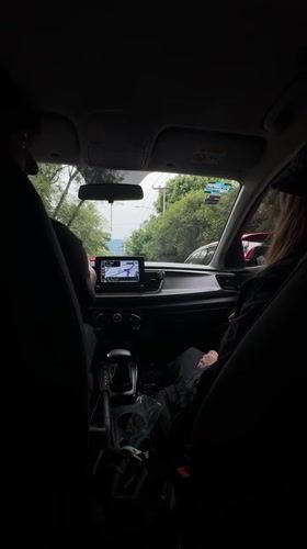Car interior view captured from backseat in Mexico City