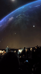 Orchestra, candlelit drinks, and a dusk aerial — one evening's range