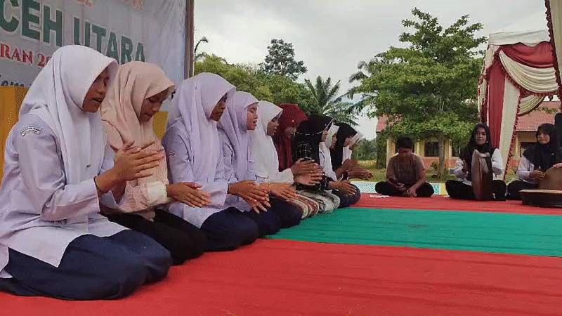 Students perform traditional dance at outdoor event in Blangriek