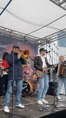 Band performs with bear mascot in Novosibirsk street event