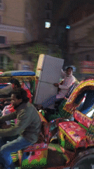 Evening street life documented across Dhaka during rush hour
