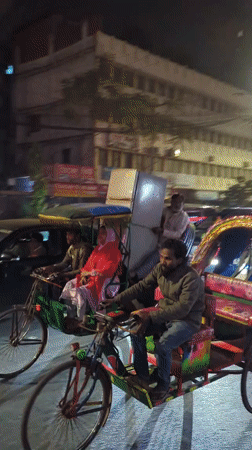 Evening street life documented across Dhaka during rush hour
