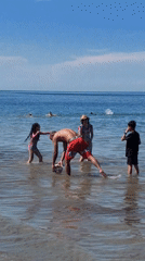 Family enjoys beach day in Dénia waters