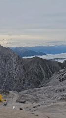 Early morning at a Garmisch alpine hut, rocky peaks all around