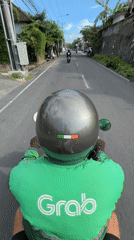 Grab driver spotted on scooter in North Kuta