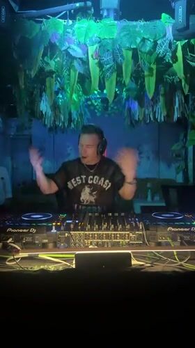 DJ performs at jungle-themed Seoul club wearing California shirt